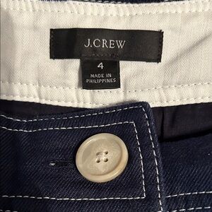 J. Crew Woman’s Navy Blue with white stitches pencil skirt &  tan buttons
